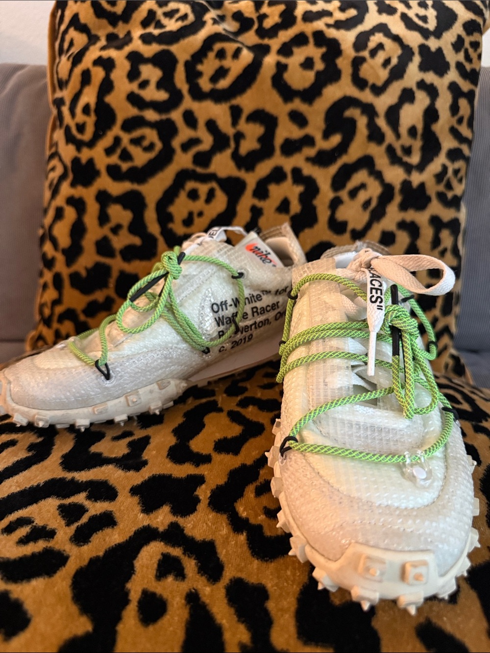 White sneakers with lime green laces